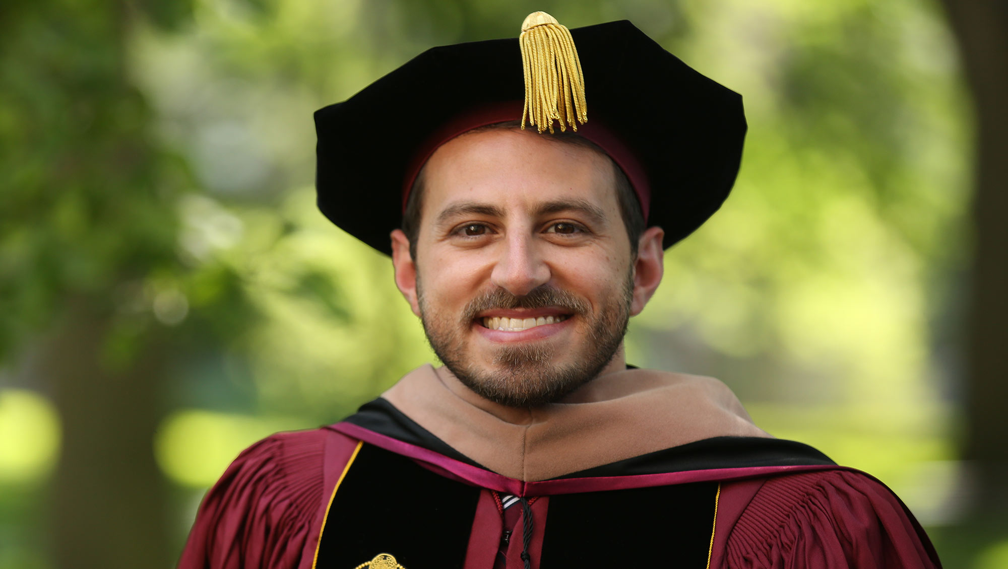 PhD '21 Program Graduate Joseph A. Micale smiles