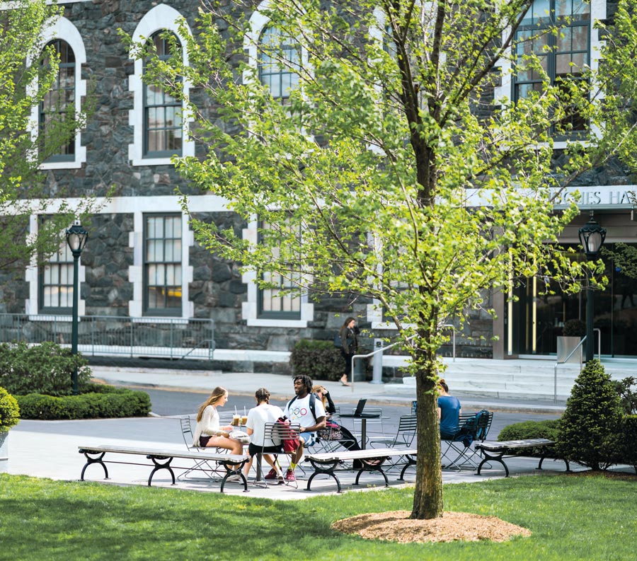Fordham students studying outside at the Rose Hill Campus