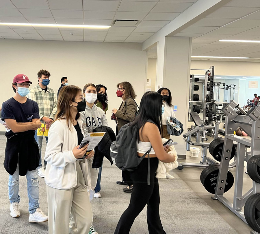 students touring the school gym