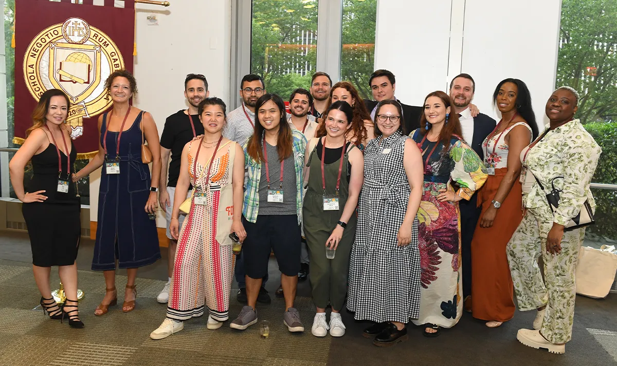 PMBA alumni pose for a group photo.